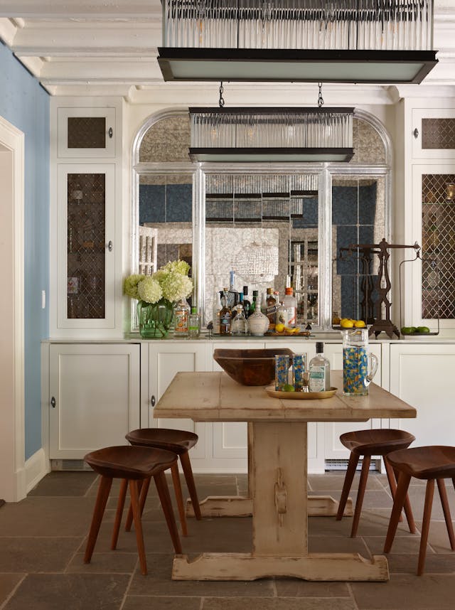 Chic kitchen bar area in a Long Island Colonial Revival home featuring classic design and modern amenities, by K.A. Murphy Interiors.