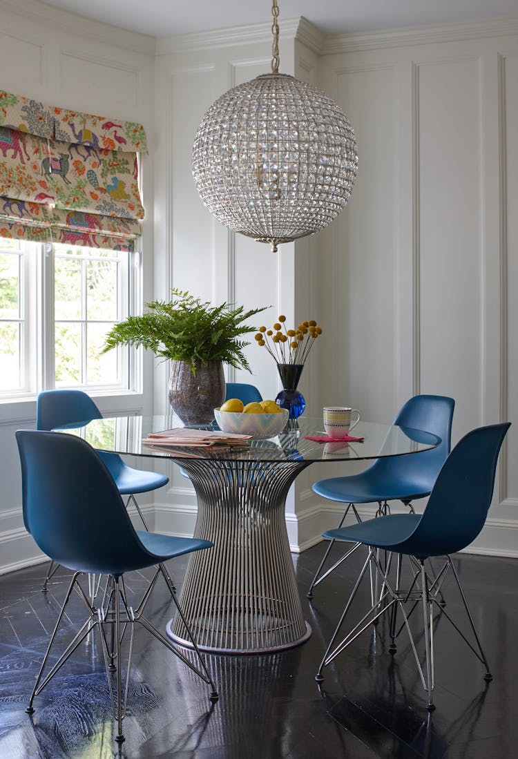 Stylish kitchen table in a Long Island Colonial Revival home, blending traditional design with contemporary touches, by K.A. Murphy Interiors
