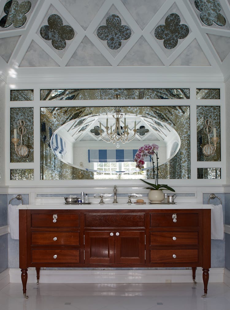 Stylish master bathroom vanity in a Long Island Colonial Revival home, blending traditional design with modern amenities, by K.A. Murphy Interiors