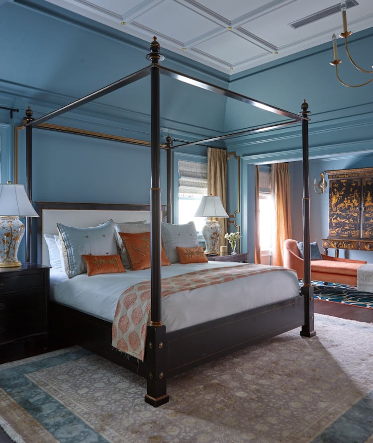 Luxurious master bedroom in a Long Island Colonial Revival home with traditional furnishings and elegant design, by K.A. Murphy Interiors