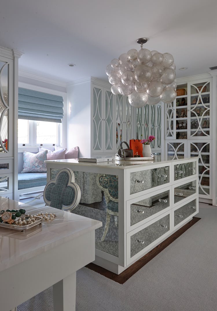 Chic closet vanity area in a Long Island Colonial Revival home, offering a blend of traditional design and modern functionality, by K.A. Murphy Interiors