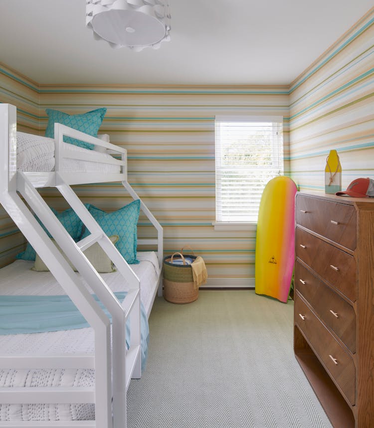 Cozy bunk room in a Montauk retreat, perfect for guests, designed by K.A. Murphy Interiors