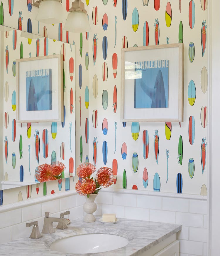 Chic half bathroom in a Montauk retreat with coastal-inspired decor, designed by K.A. Murphy Interiors