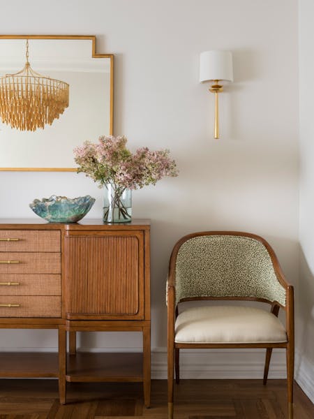 Stylish corner chair in the living area of an Upper West Side apartment, designed by K.A. Murphy Interiors