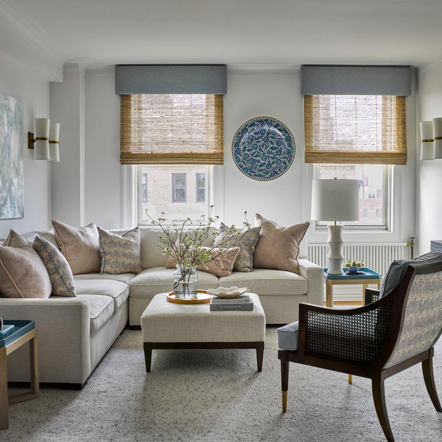 Sophisticated living room in an Upper West Side apartment featuring vibrant colors and durable materials, designed by K.A. Murphy Interiors