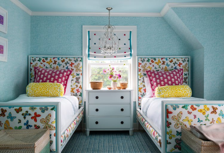 Guestroom with twin beds in a Long Island luxury home designed for comfort by K.A. Murphy Interiors.