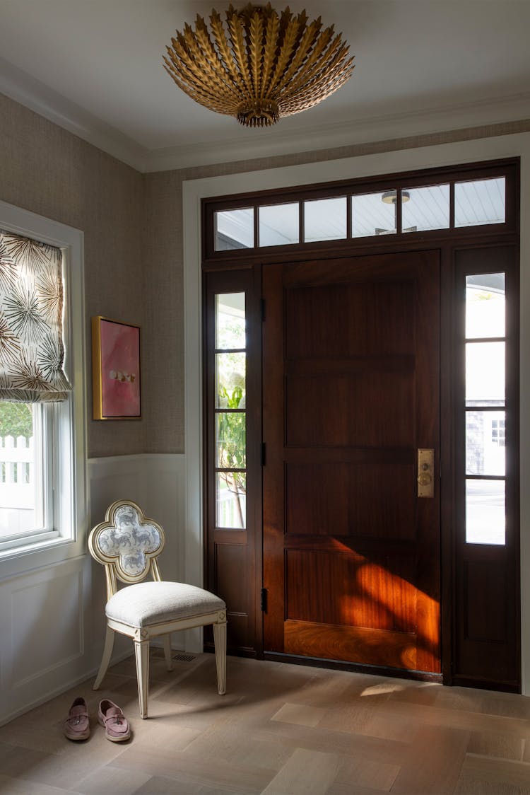 Welcoming entryway in a Long Island coastal home with seaside-inspired accents by K.A. Murphy Interiors.