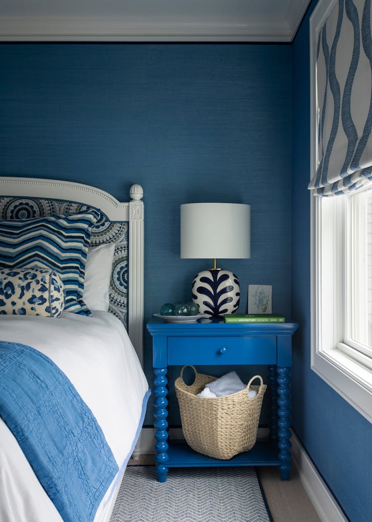 Tastefully decorated guest bedroom in a Long Island luxury coastal home by K.A. Murphy Interior