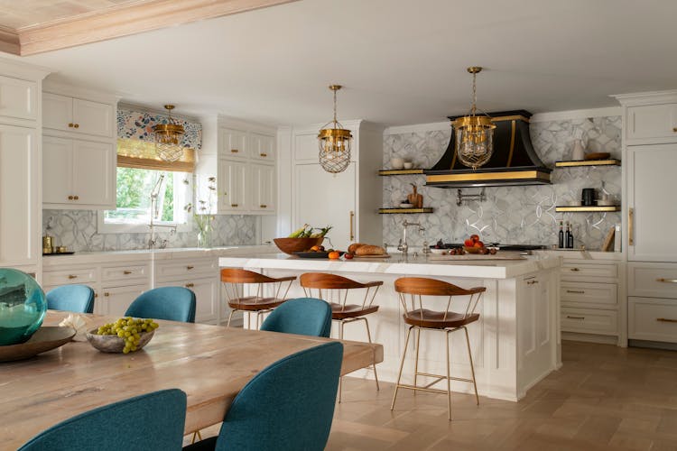 Contemporary kitchen in a Long Island coastal retreat with high-end appliances and sleek cabinetry by K.A. Murphy Interiors