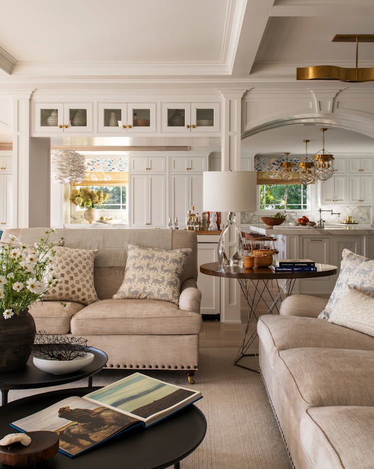 Open-concept Long Island living room transitioning seamlessly into a modern kitchen by K.A. Murphy Interiors