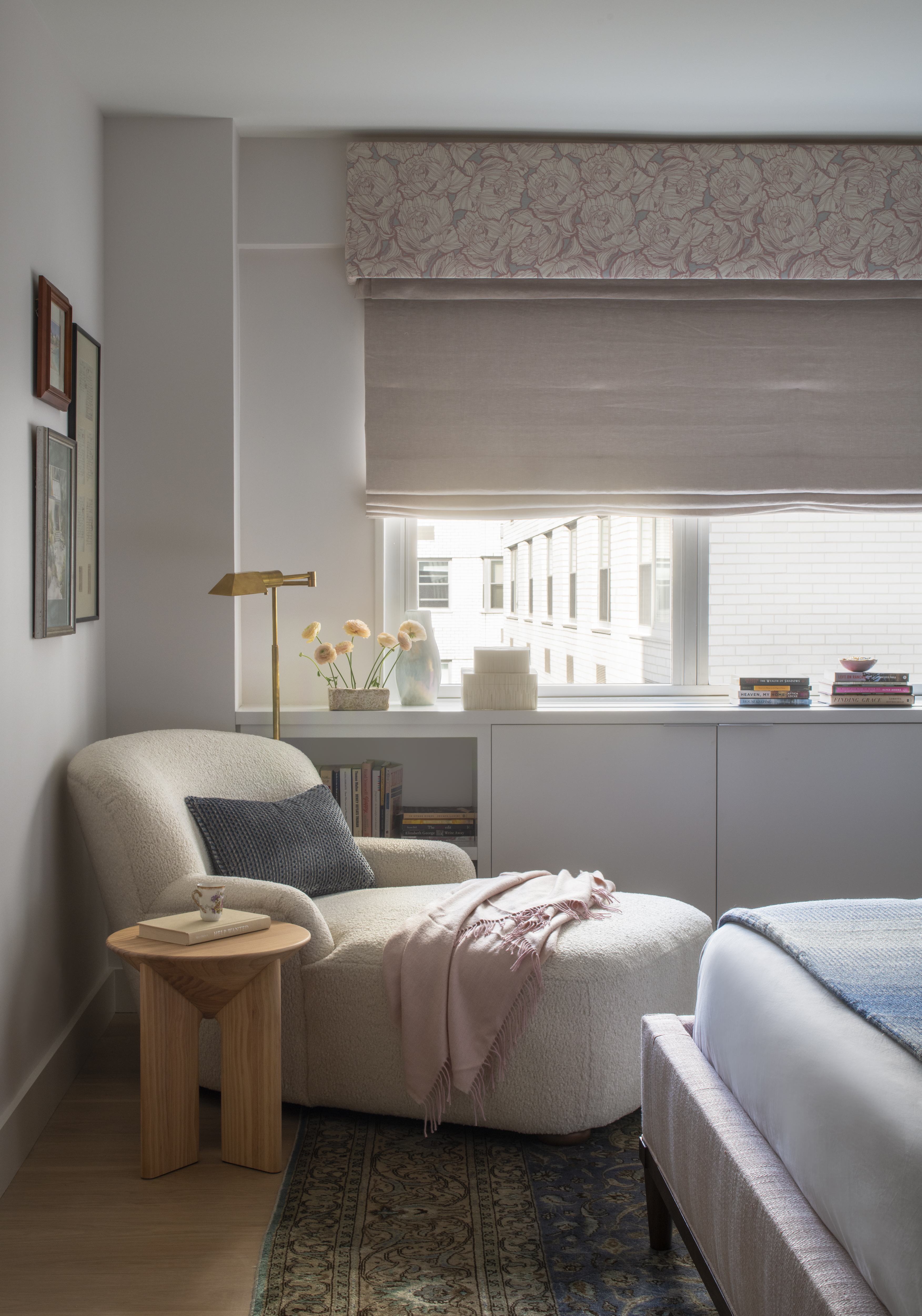 Primary bedroom reading nook with a chaise lounge, custom millwork, and soft layered textiles by K.A. Murphy Interiors.