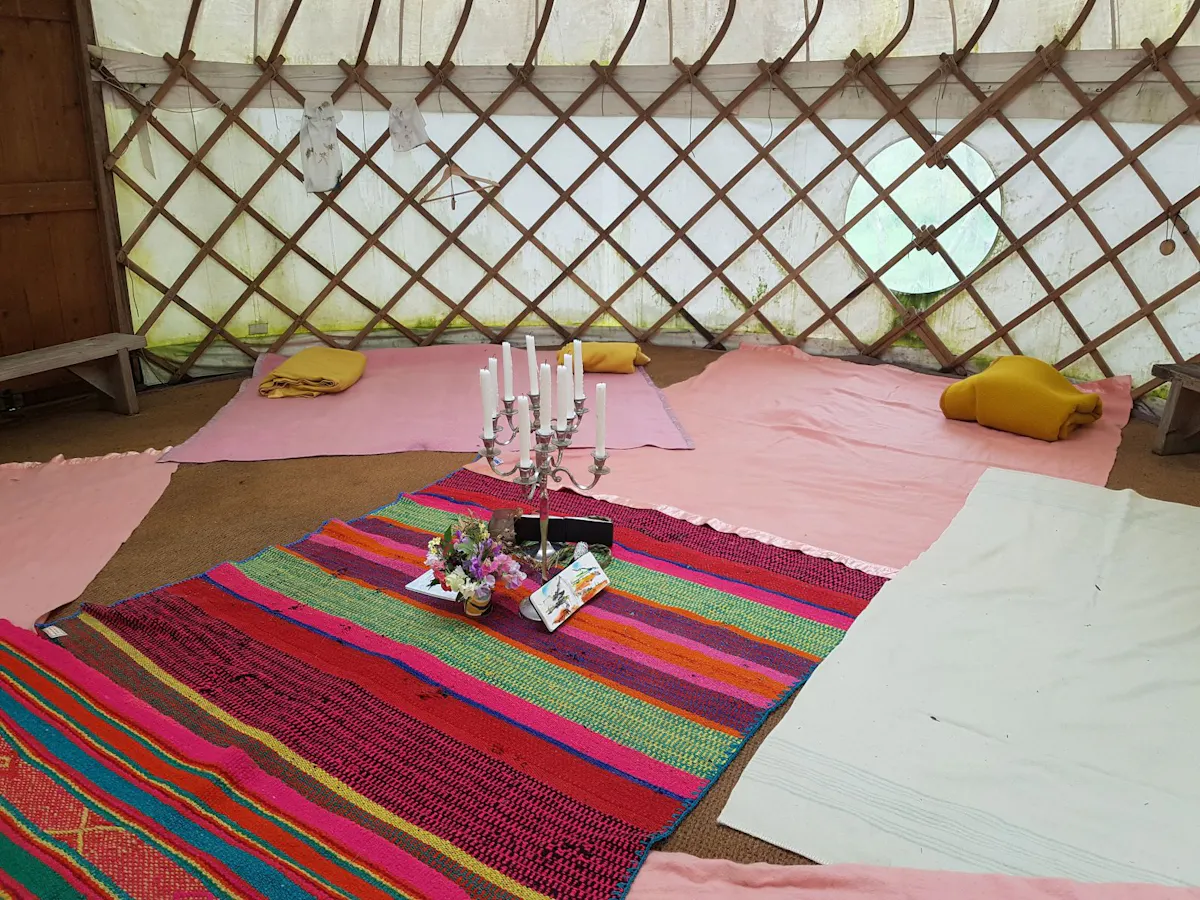 inside the yurt, preparing the altar
