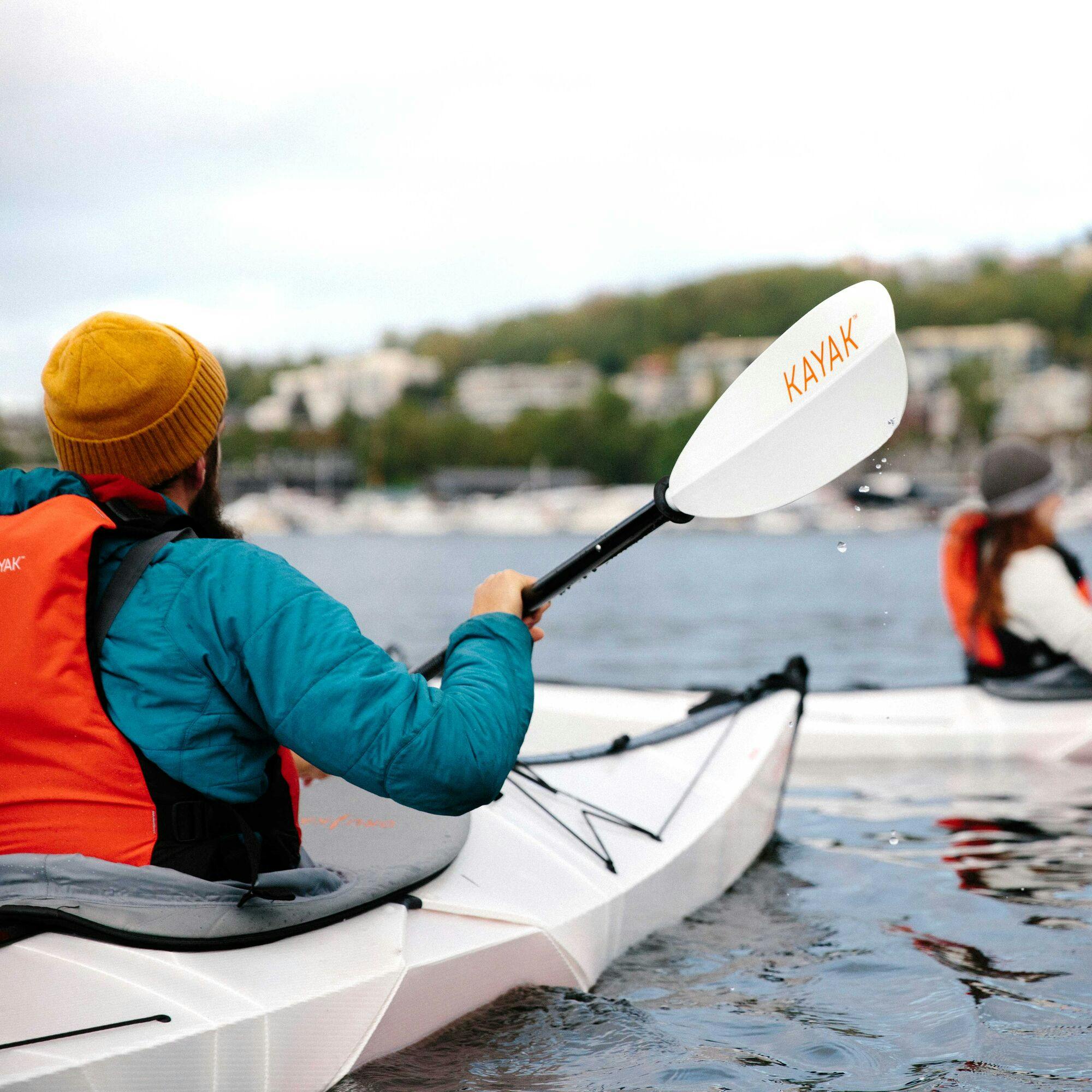 A kayaker is using on Oru foldable kayak.