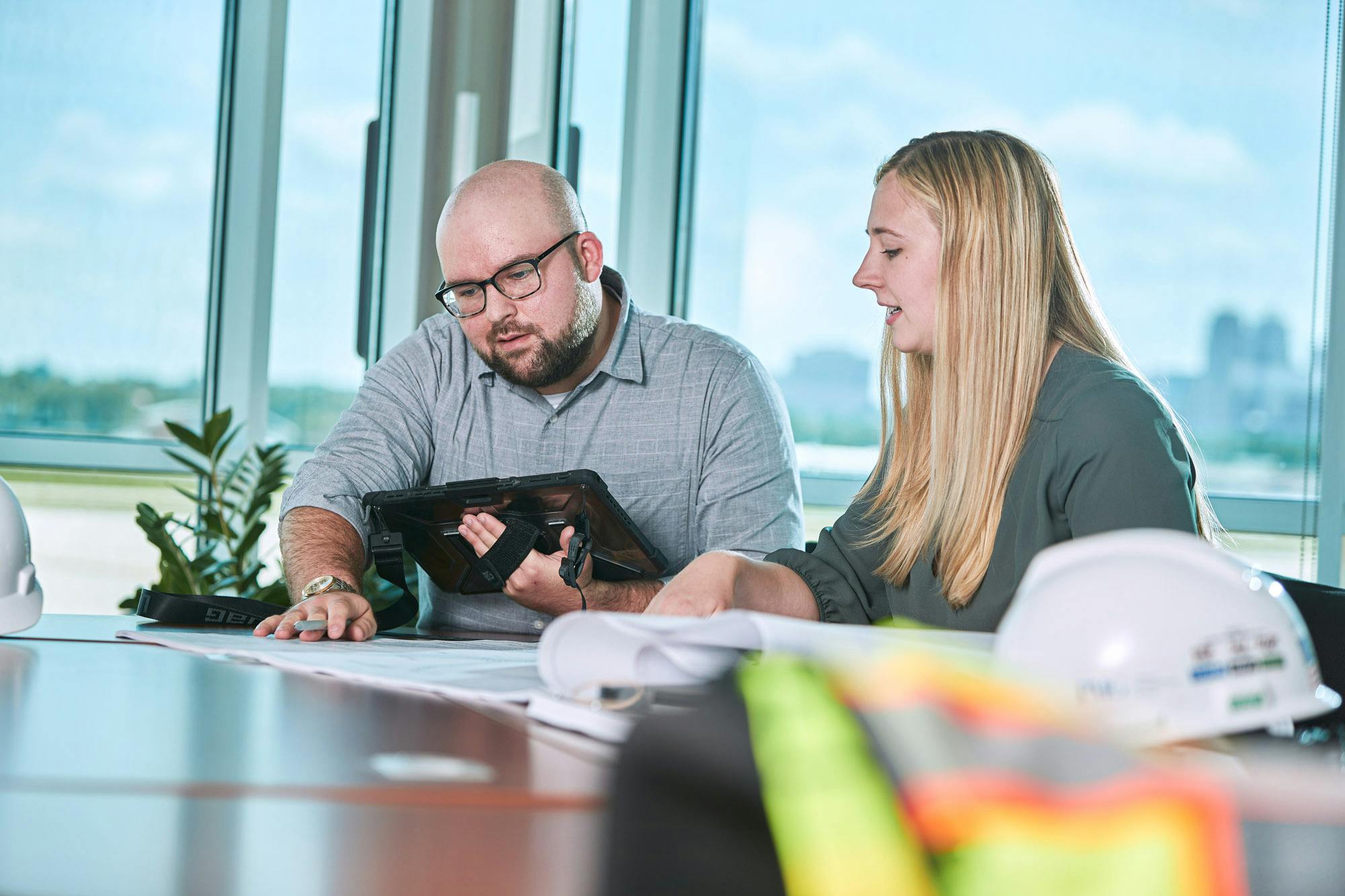 Employees discussing work.