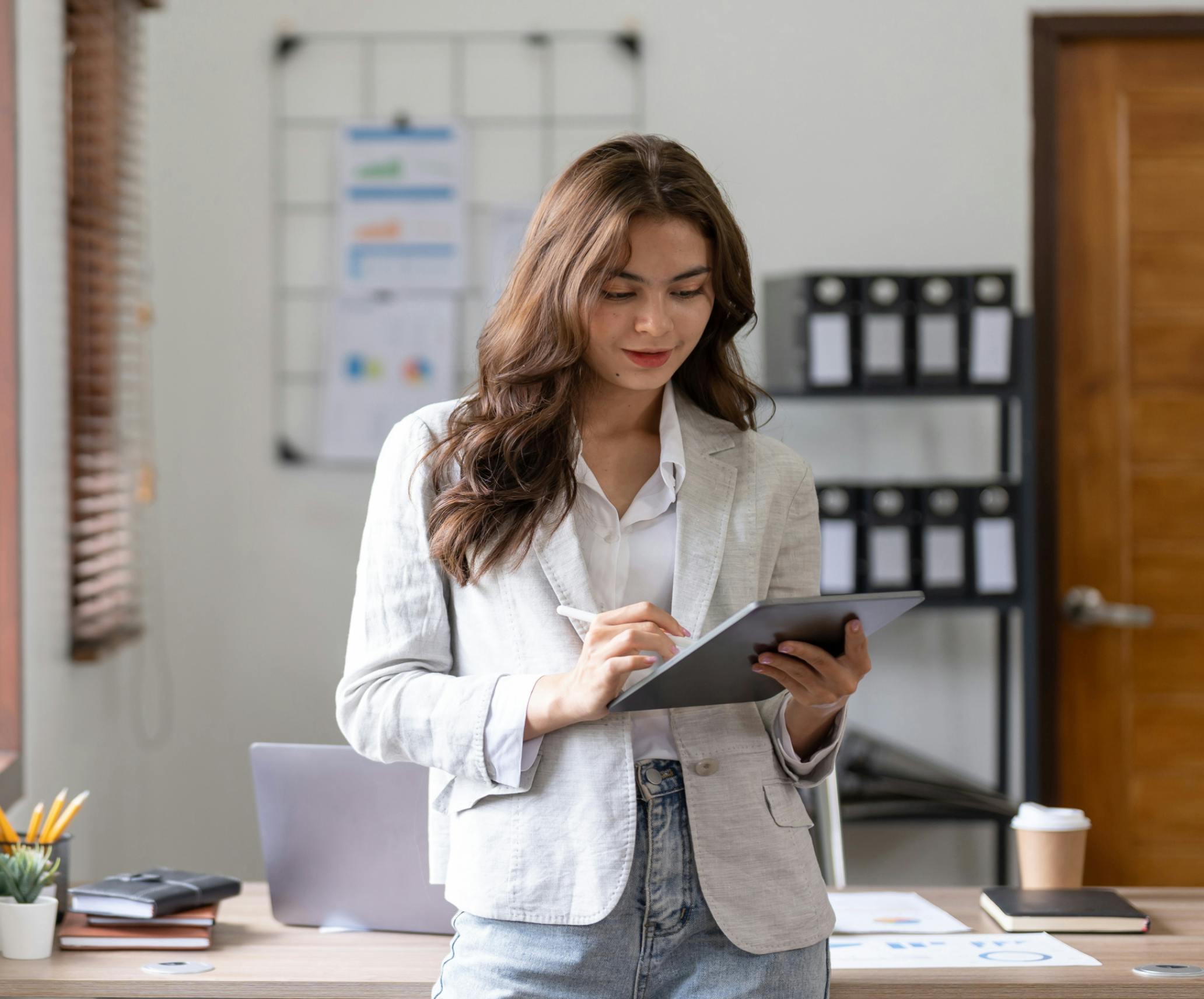 Woman looking at her tablet