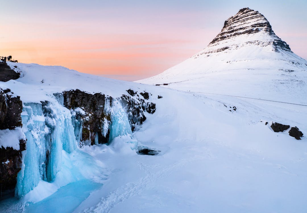 Snow coverd mountain and waterfall
