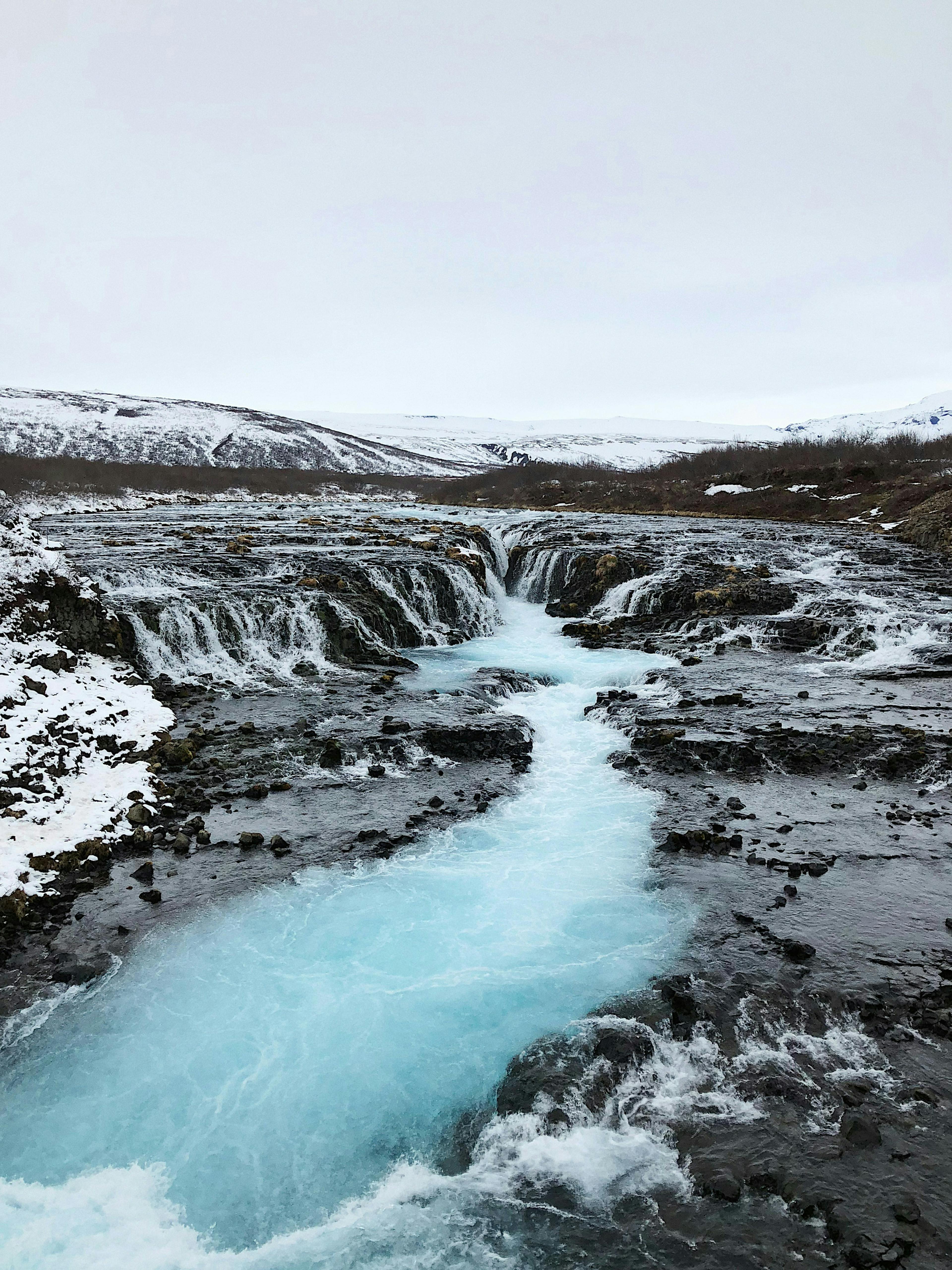 Winter scene in Icelandic nature of a waterfall