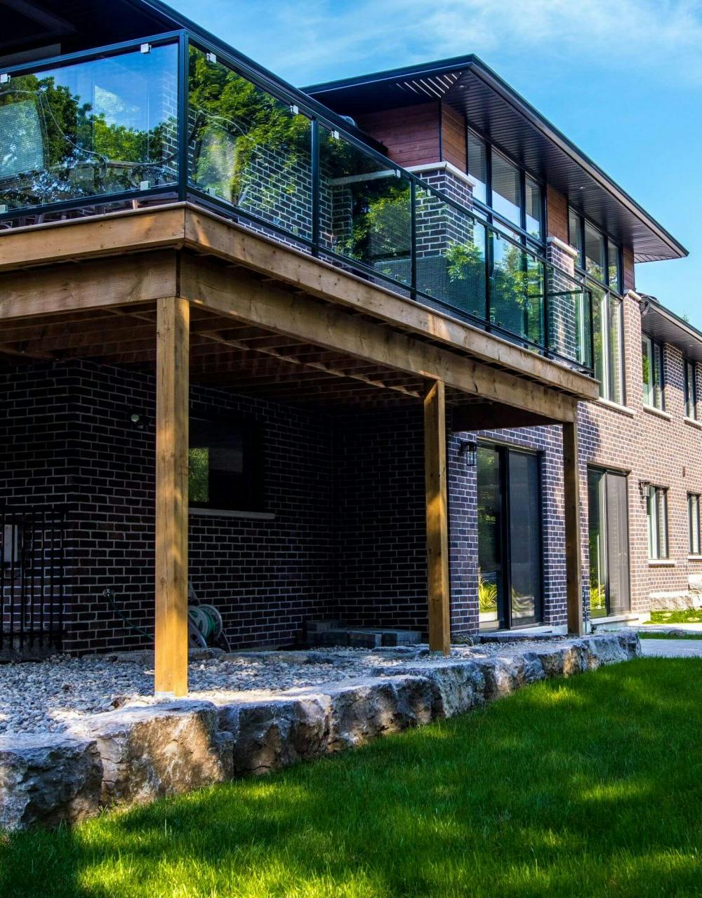Image of a deck with a glass railing