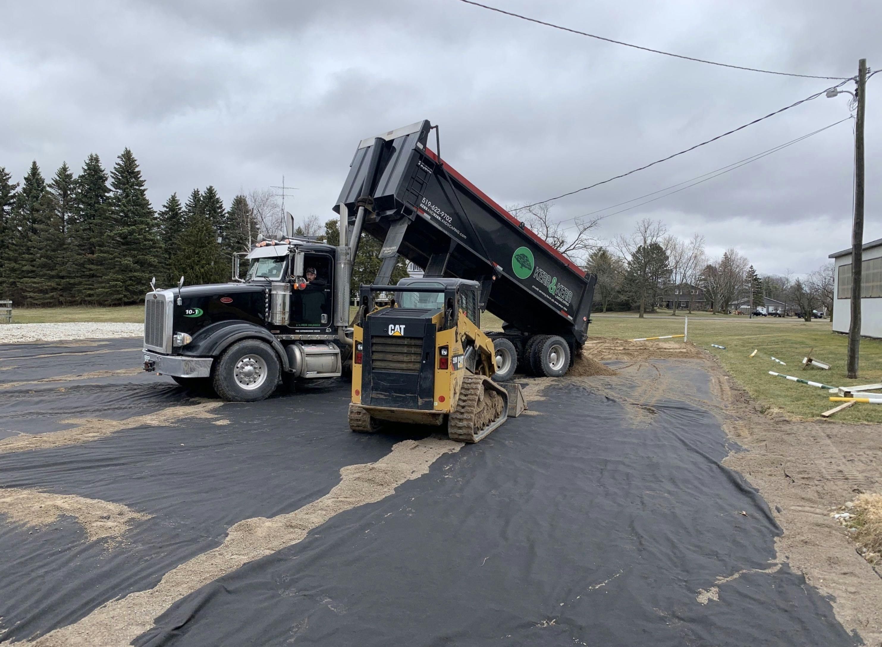 Large Kerr & Kerr truck delivering soil