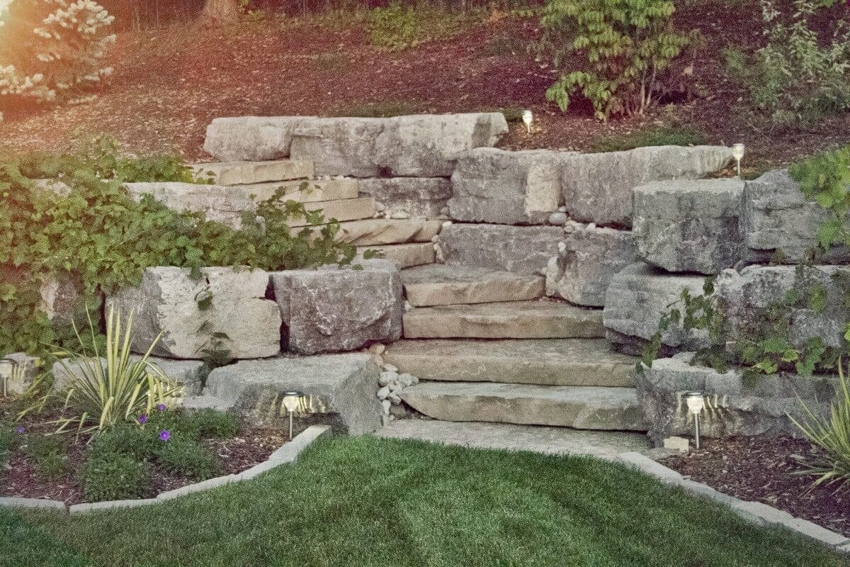 Stone steps leading down into a garden area