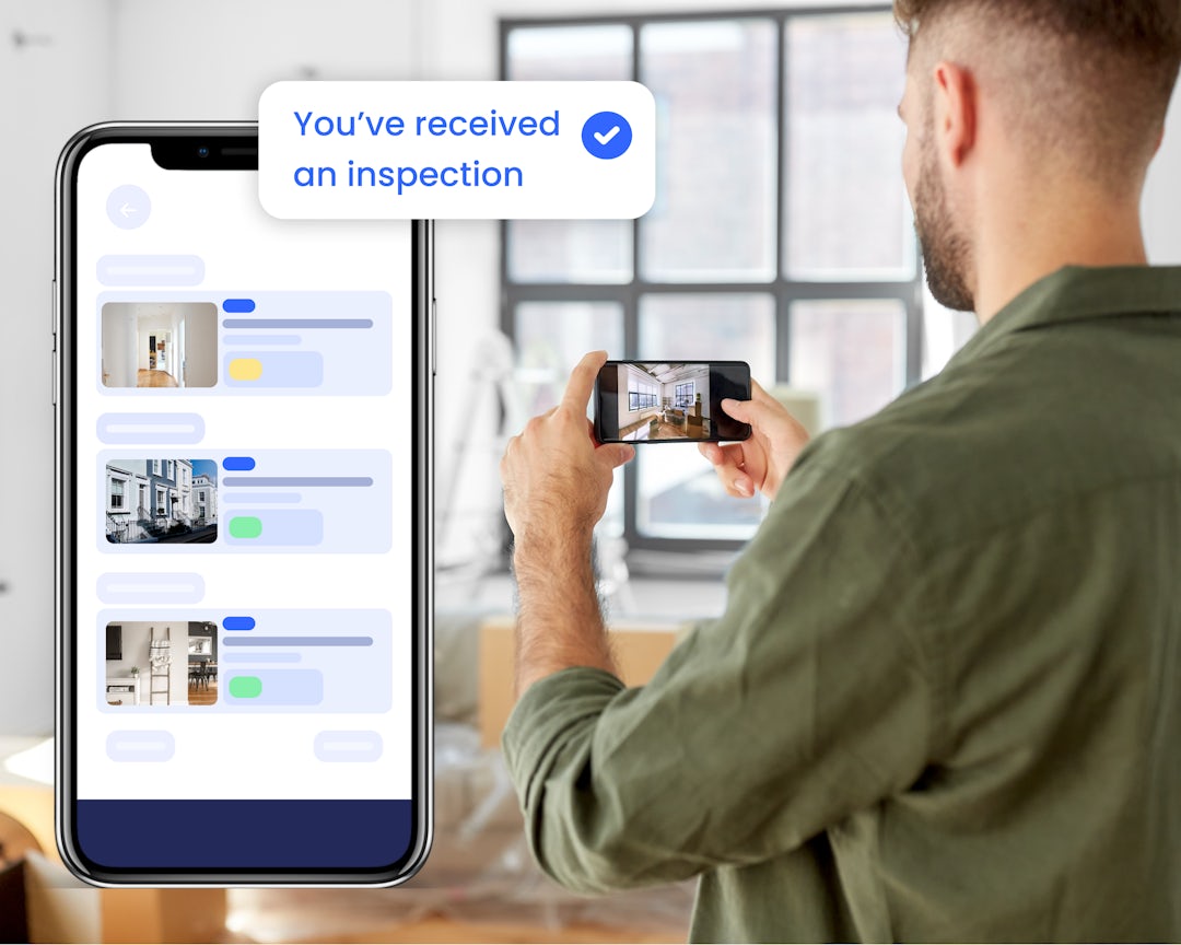A man conducting an inspection on his phone. A phone displaying an inspection and a notification.