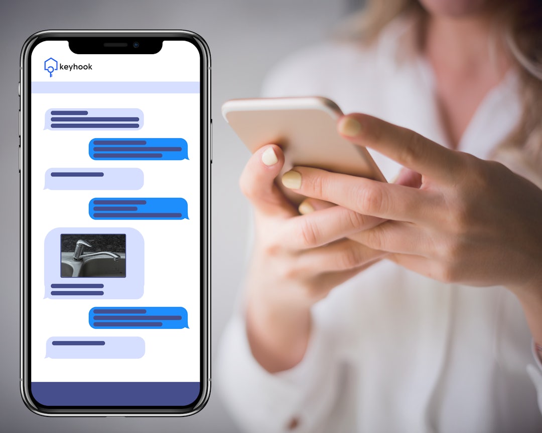 A woman on her phone. A message display on Keyhook.