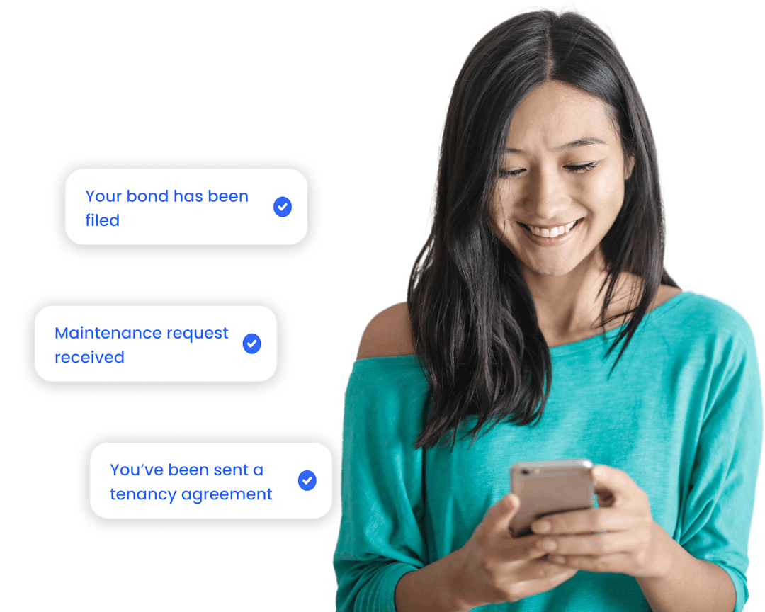 Woman smiling at her phone