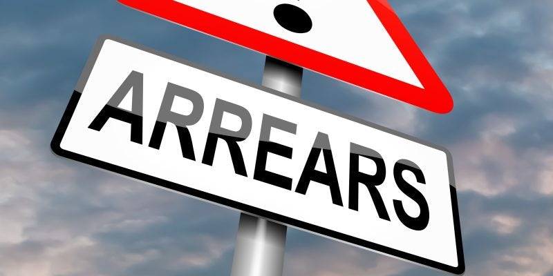 Sign saying Arrears