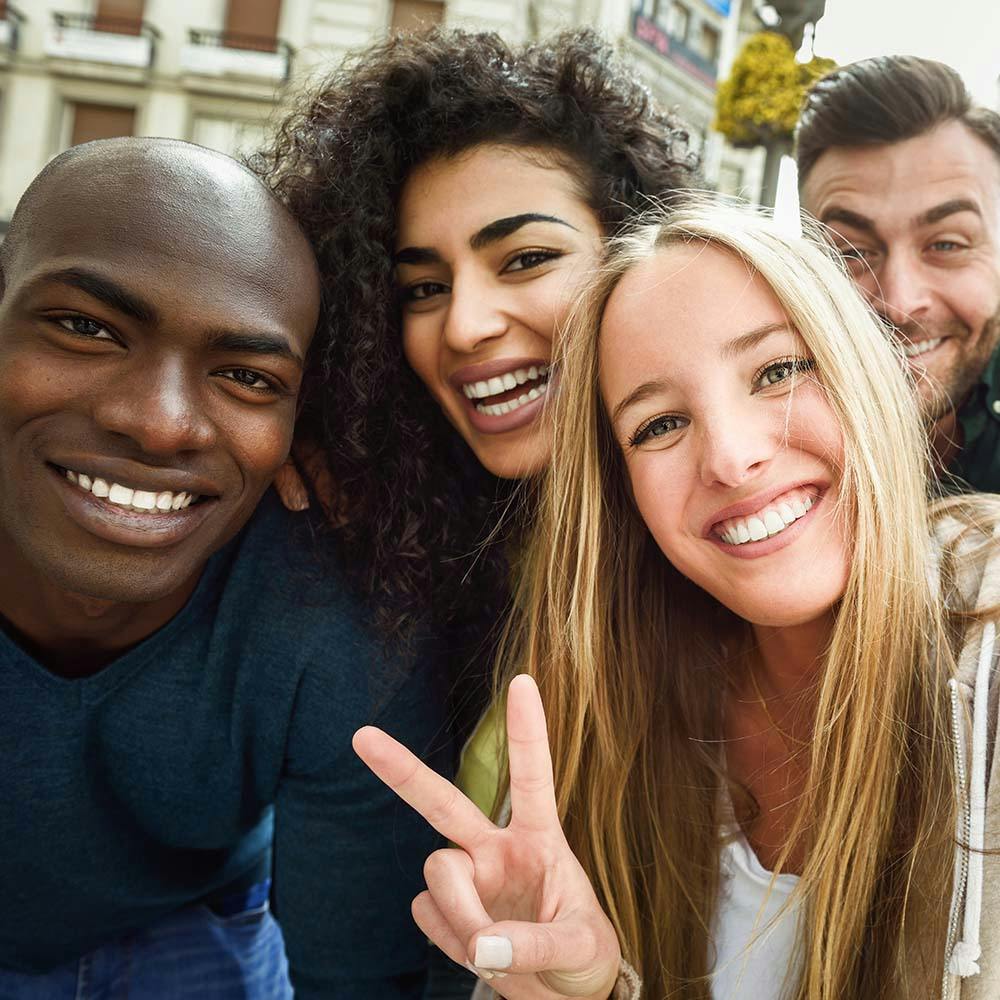 A group of friends pose for a photo