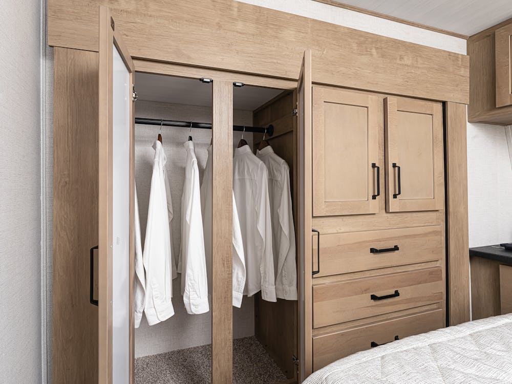 Carbon 358 Closet, hanging clothes on one side, drawers on the other