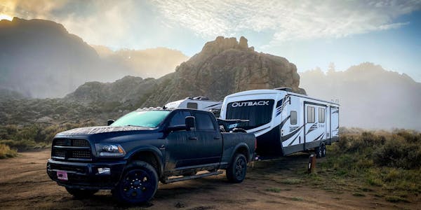 Outback travel trailer being pulled in the mountains