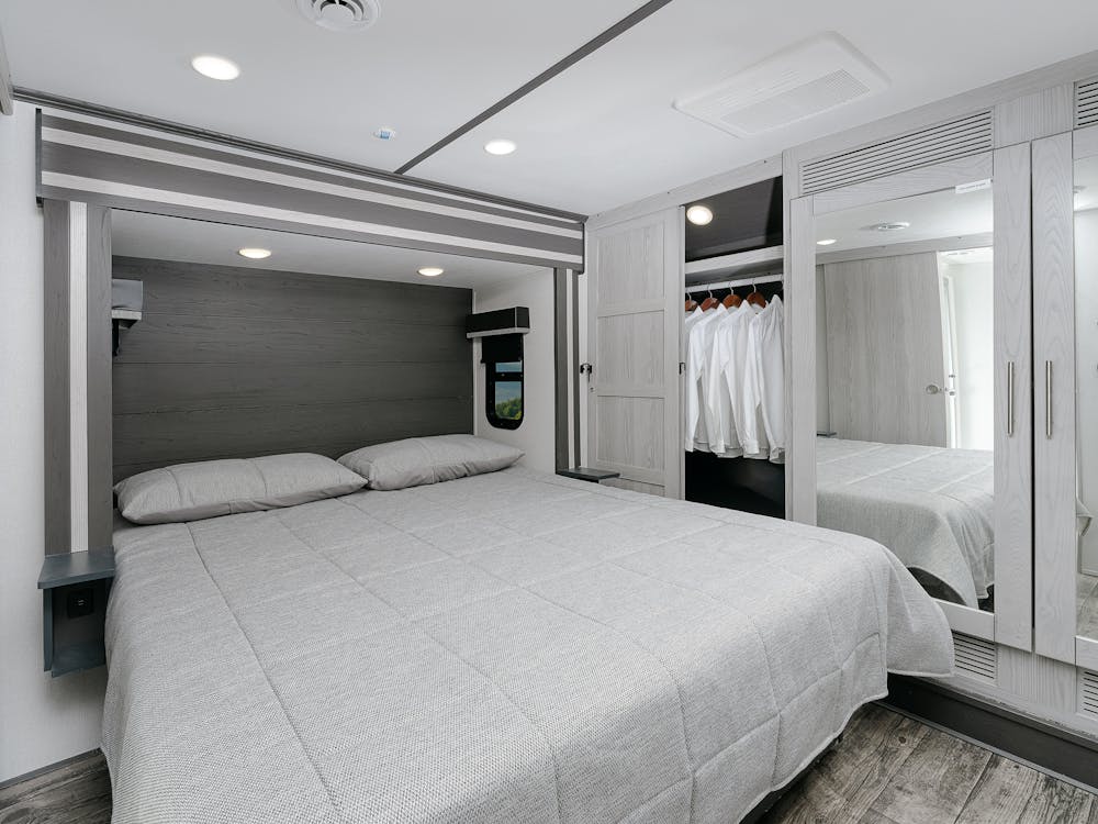 Fuzion 421 bedroom, wardrobe and king sized bed shown in photo
