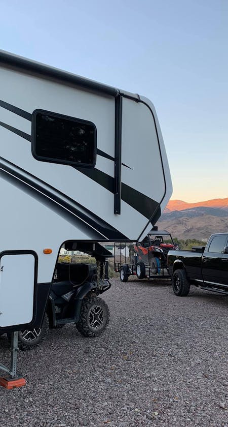 Keystone RV's Raptor and Carbon fifth wheel RV toyhaulers, travel ...