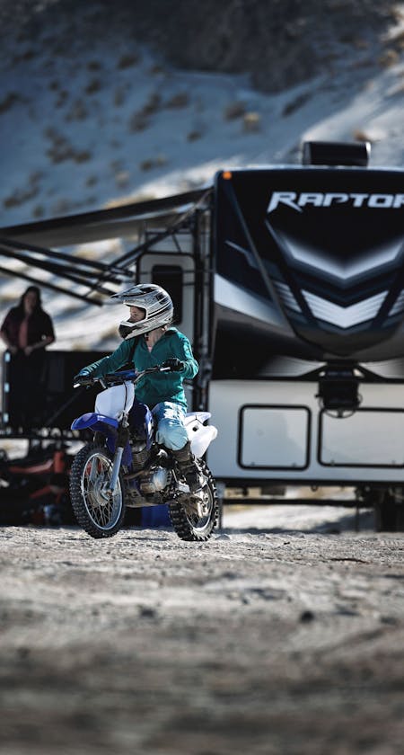 Keystone RV's Raptor and Carbon fifth wheel RV toyhaulers, travel ...
