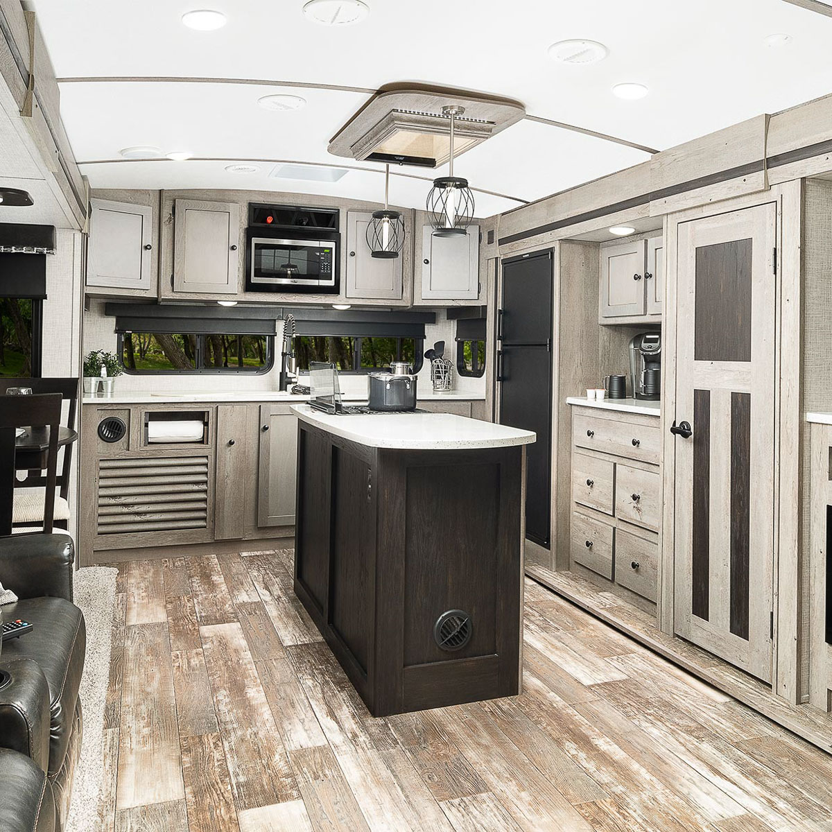 travel trailer with kitchen island and bunkhouse