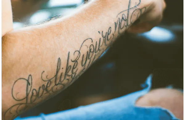 Lettering Style Tattoos on arm