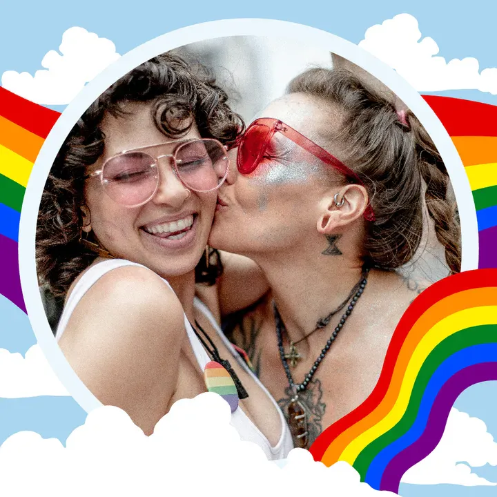 A profile picture frame design with a pride filter featuring a rainbow surrounding the center area where a user's photo can be placed. The background shows blue sky and clouds, with a sample image of two feminine individuals kissing - Kittl