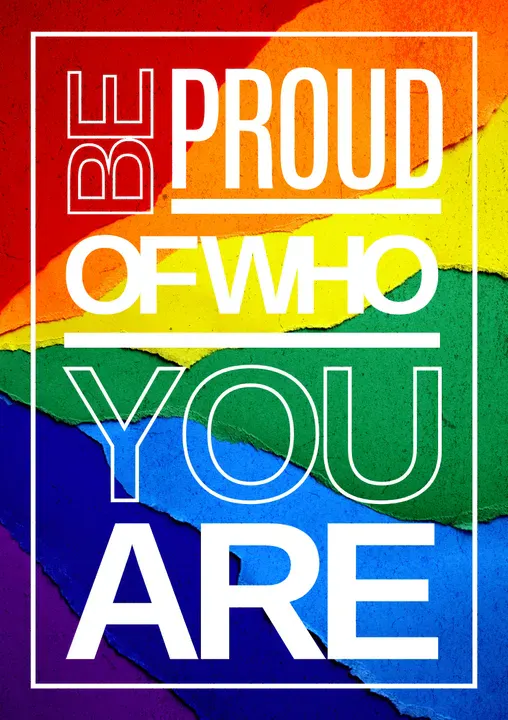 A minimalist quote poster featuring a rainbow-painted background with a rough, artistic texture. The text “Be proud of who you are” is split into two styles: “Be’ and “You” outlined without fill, the rest in solid white - Kittl