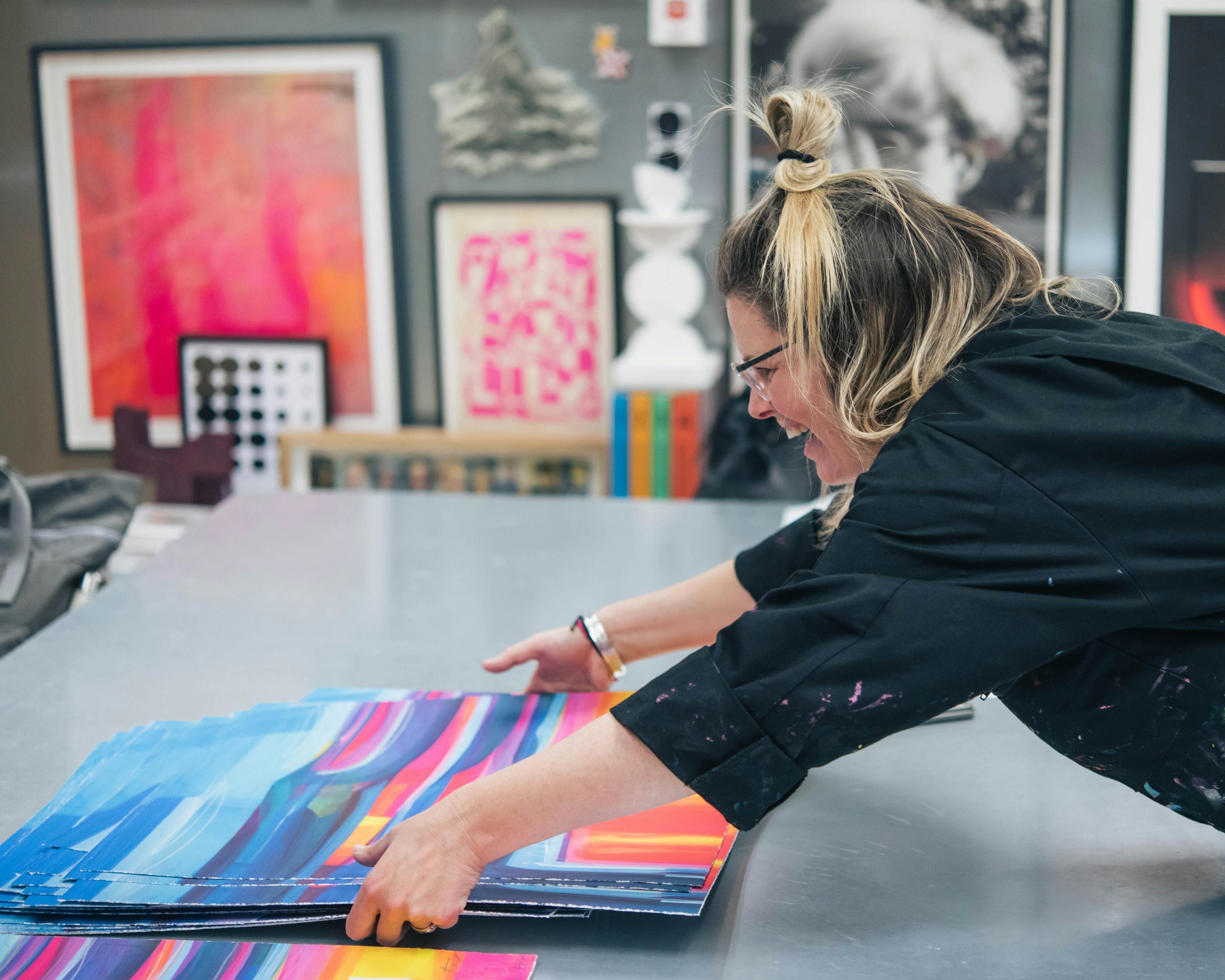 Faye Bridgwater examines one of her new Limited Editions, Happy Soul, at King & McGaw