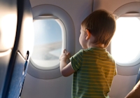 barn på flygplan
