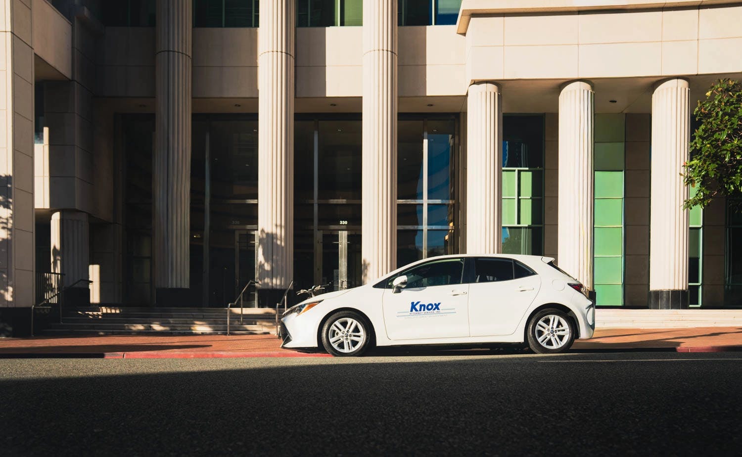 Knox Services fleet vehicle at San Diego Courthouse