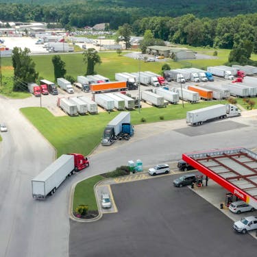 Drone shot of the Kodiak truck driving to the truckport