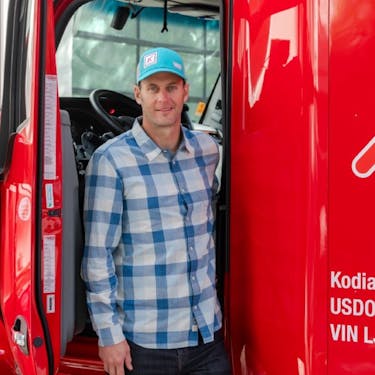 Photo of Jamie in the Kodiak truck