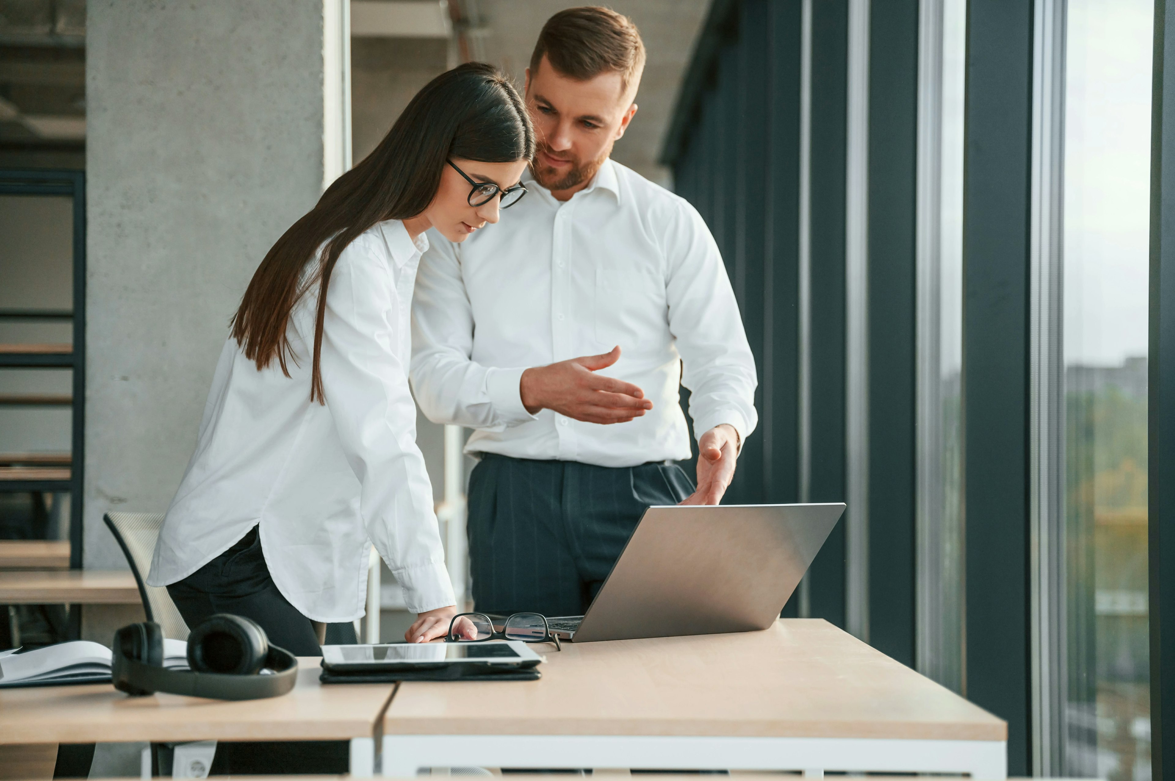 Man and woman on a computer