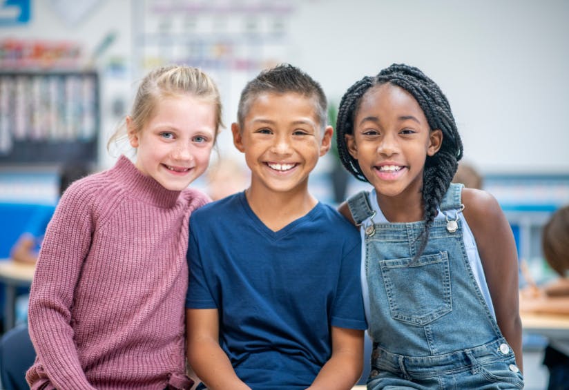 three children smiling