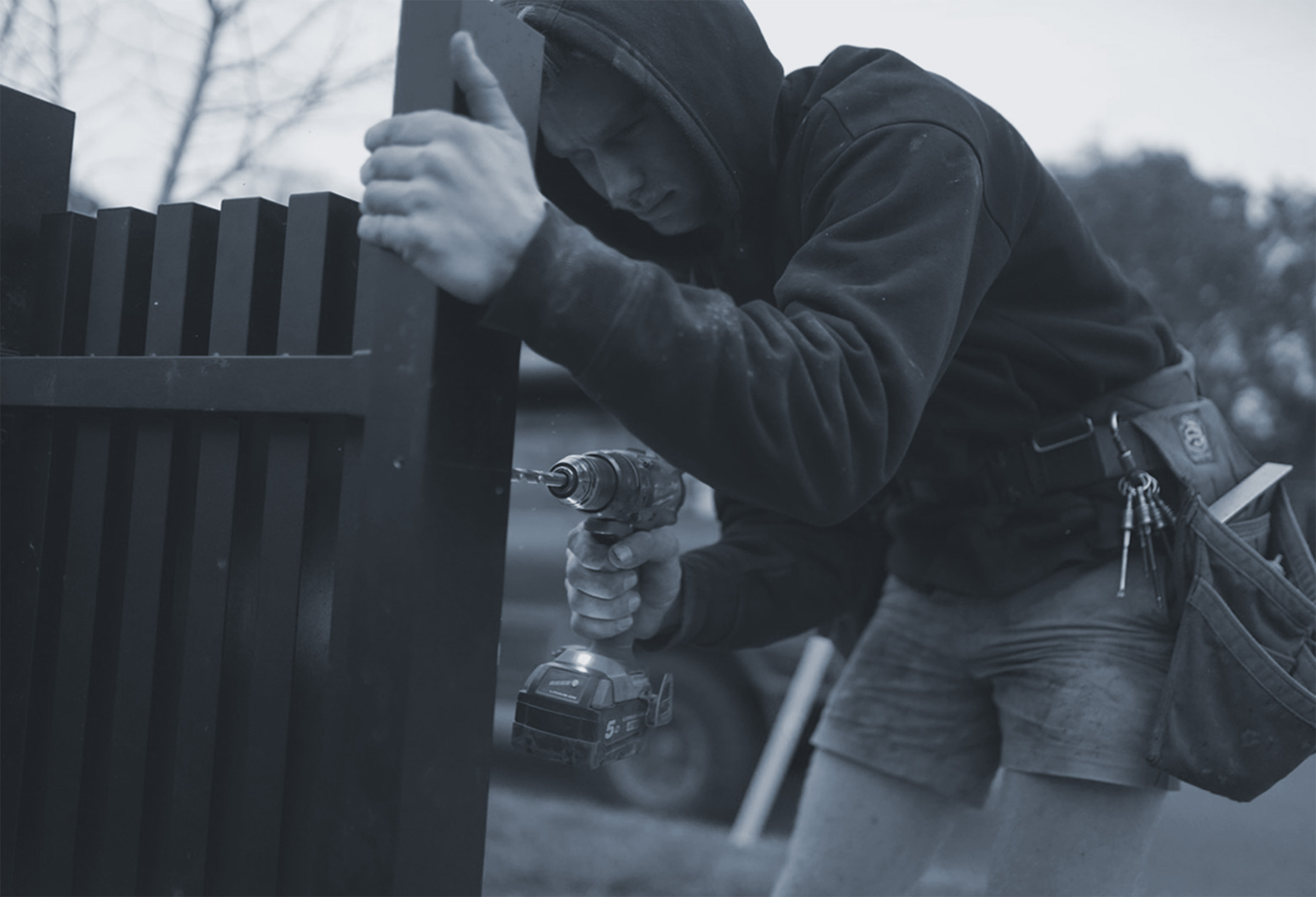 Dave Dunstan doing works on a fence