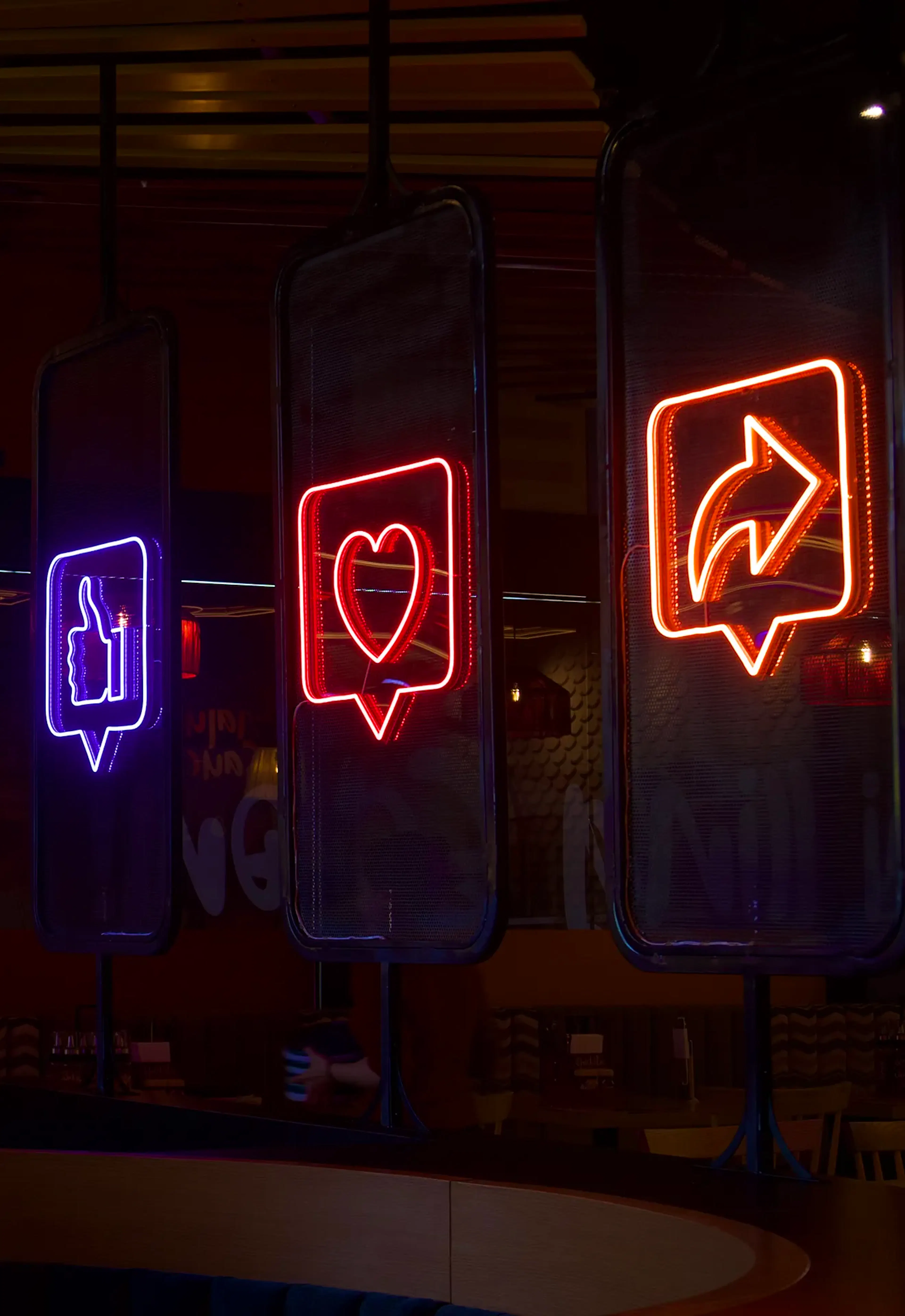 Neon signage of symbols - thumbs up, love heart, reply