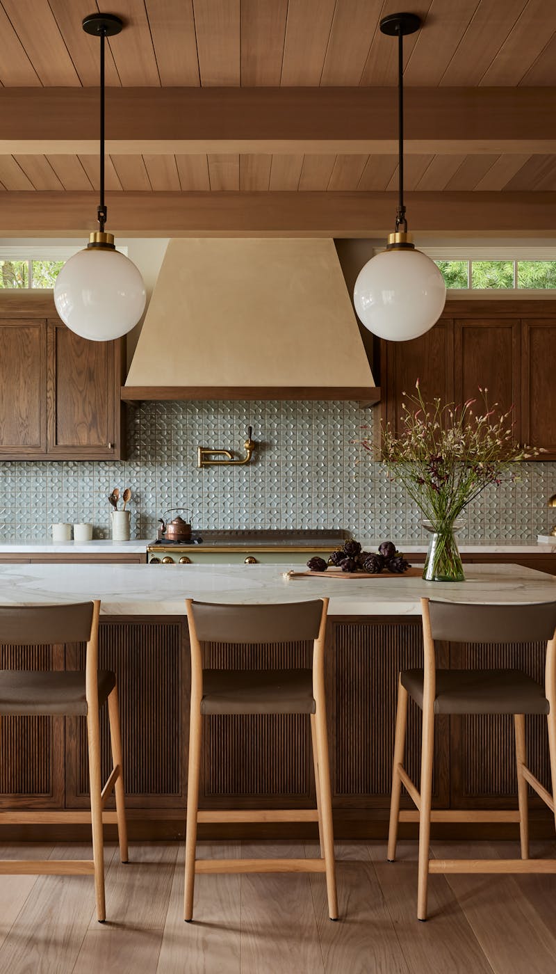 Kristen-Peña-Interiors-Pebble-Beach-Family-Home-Kitchen-Island-High-Top-Chairs