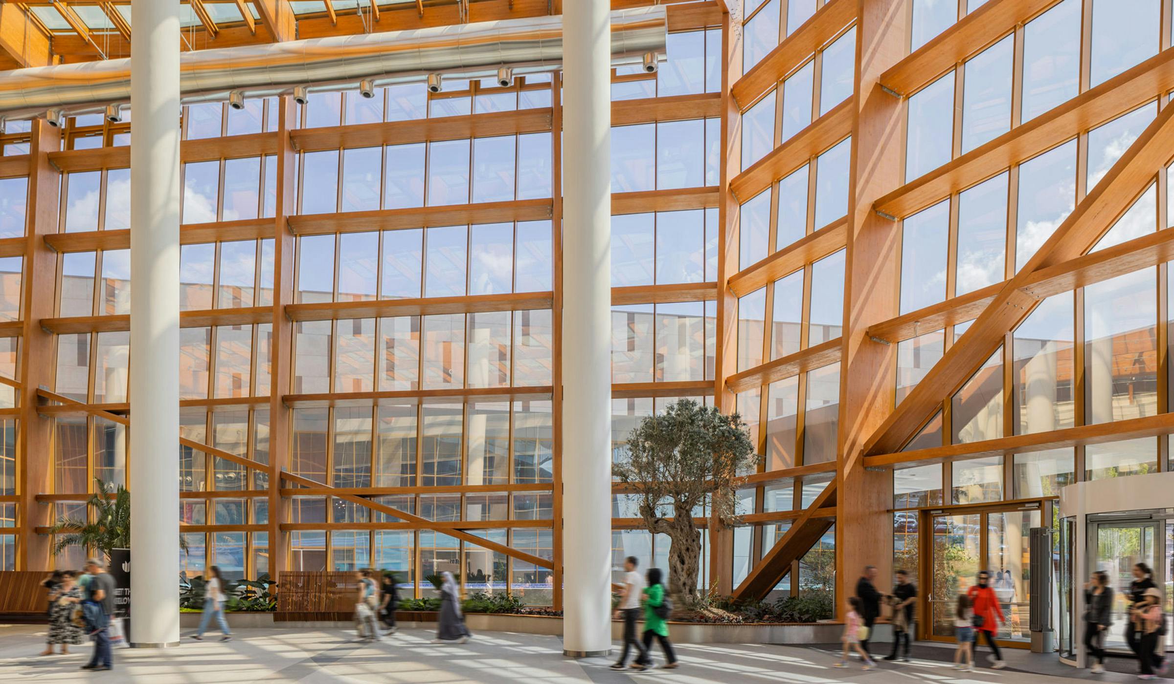 Prishtina Mall well lit interior with glulam structure