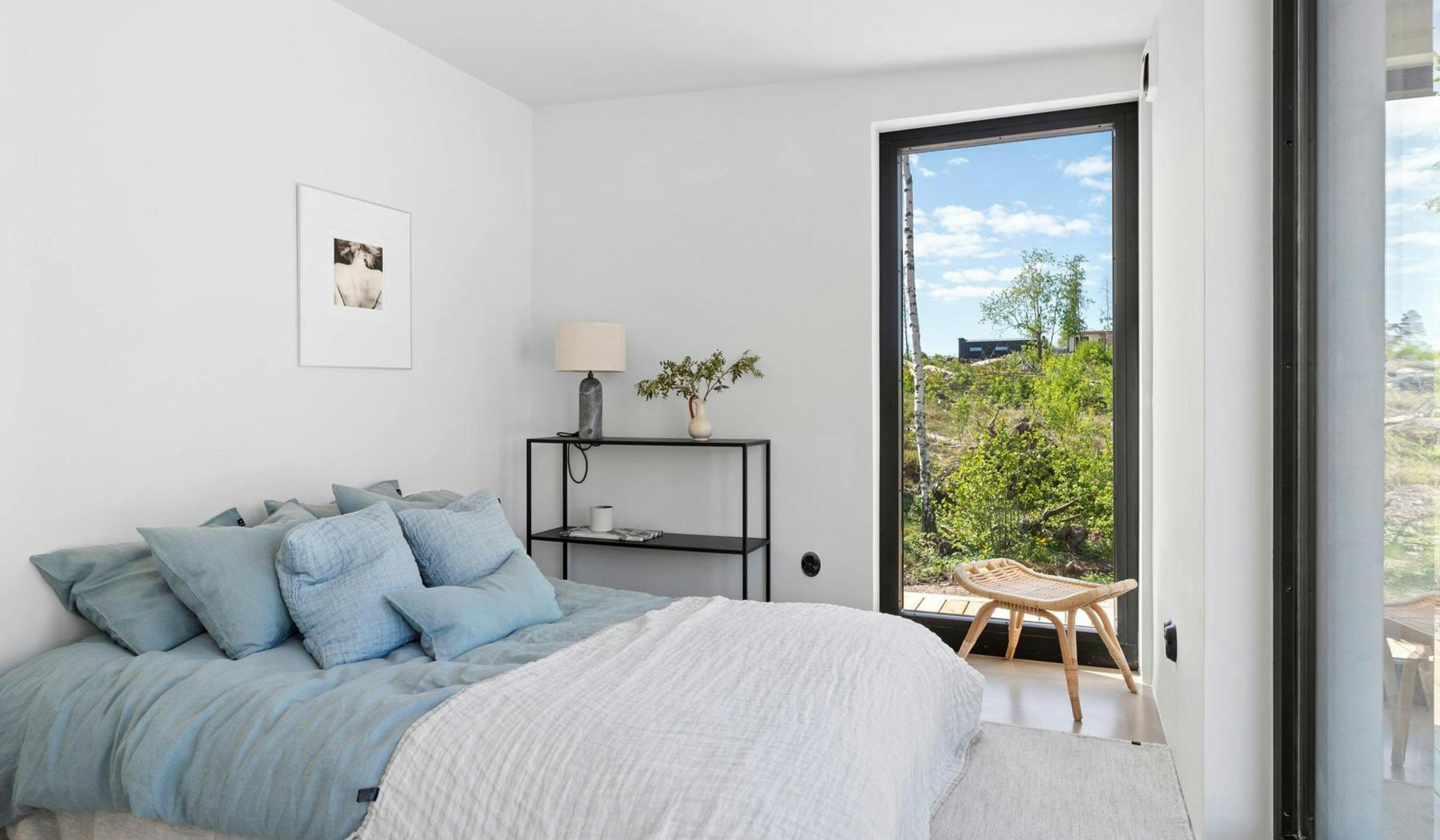 Big windows in a simple bedroom